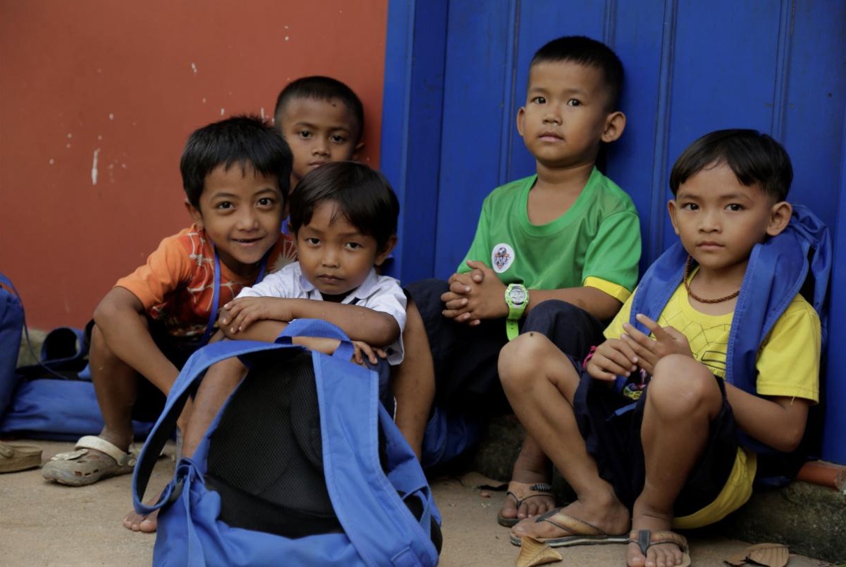 Young students with their school bags at Bayon School