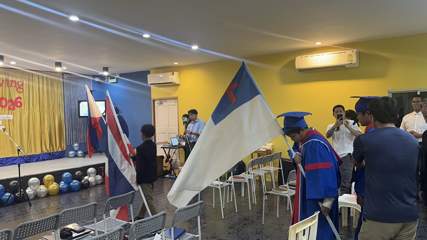 Students carrying the flags into the ceremony